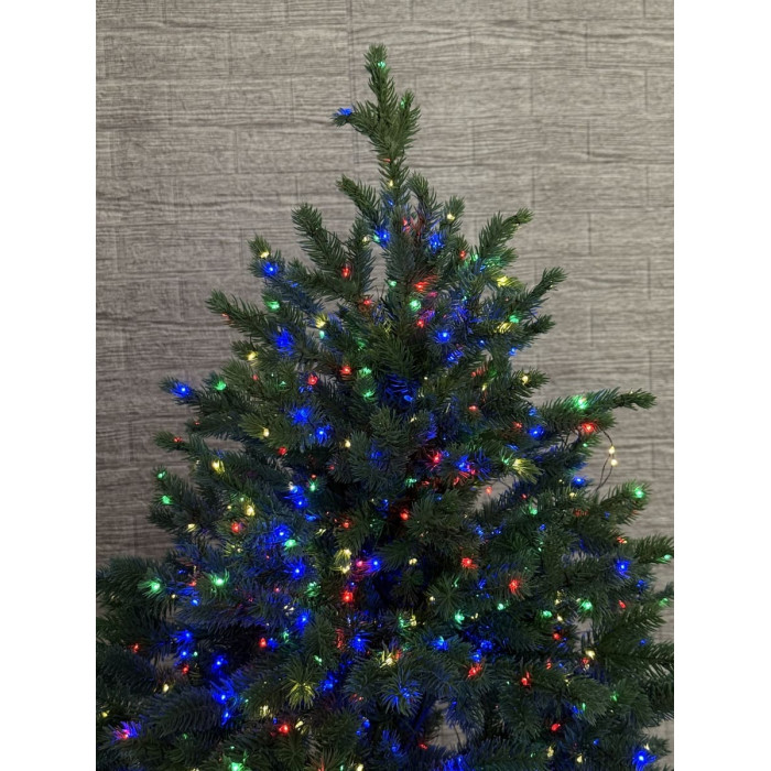 Новорічна ялинка на пеньку з кольоровою гірляндою 1 метр