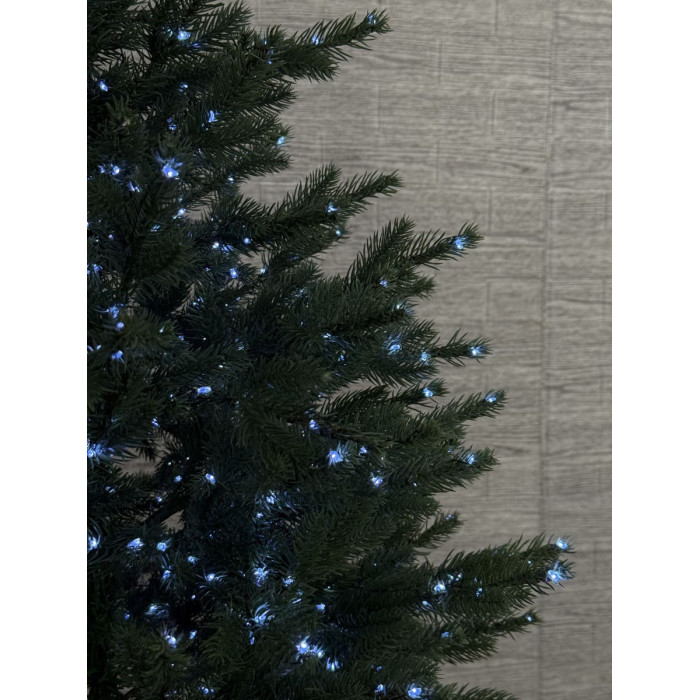 Новорічна ялинка на пеньку з гірляндою холодного білого світла 1 метр