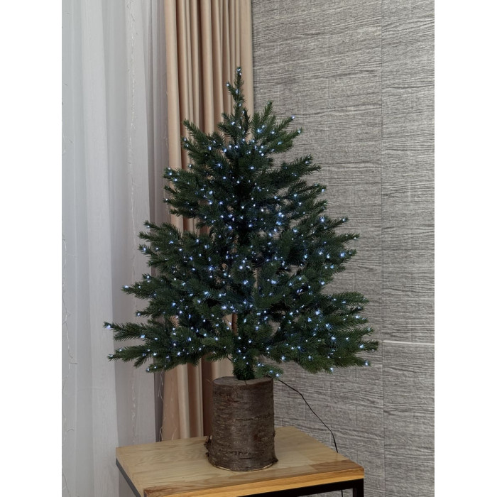 Новорічна ялинка на пеньку з гірляндою холодного білого світла 1 метр